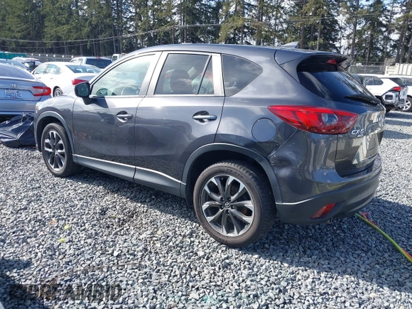 2016 Mazda CX-5 Grand Touring with VIN JM3KE4DY9G0895006, listed as a IAAI auction lot 41703146 with 39,359 mi miles. Bid and sale history available at carsss.com. Image 3.