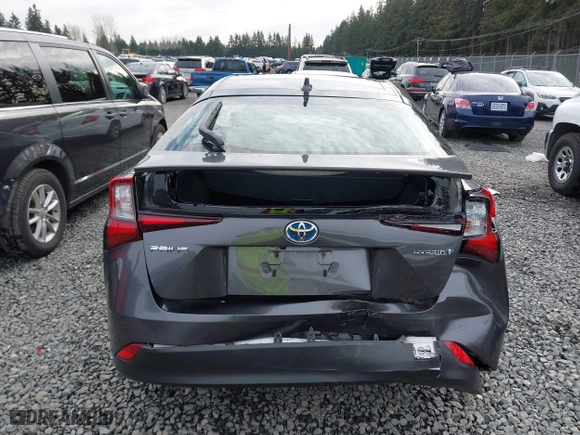 2021 Toyota Prius L Eco with VIN JTDKAMFU2M3143138, listed as a IAAI auction lot 41658263 with 102,718 mi miles. Bid and sale history available at carsss.com. Image 16.