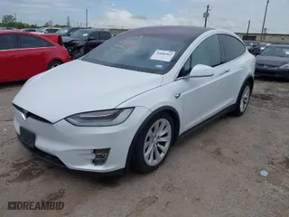 2020 Tesla Model X Long Range with VIN 5YJXCBE23LF233484, listed as a IAAI auction lot 41886062 with 1 mi miles. Bid and sale history available at carsss.com. Image 2.