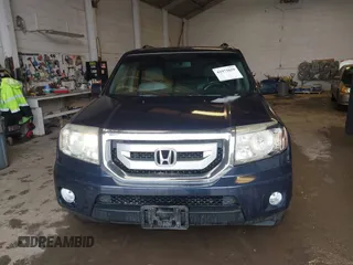 2011 Honda Pilot EX-L with VIN 5FNYF4H66BB020176, listed as a IAAI auction lot 41973659 with 238,745 mi miles and . Bid and sale history available at carsss.com. Image 12.