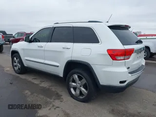 2013 Jeep Grand Cherokee Overland with VIN 1C4RJECG3DC620873, listed as a IAAI auction lot 40909601 with 195,374 mi miles. Bid and sale history available at carsss.com. Image 3.