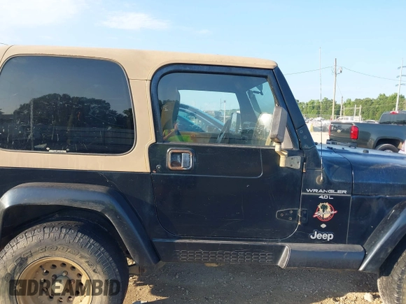 2000 Jeep Wrangler Sahara with VIN 1J4FA59SXYP718029, listed as a IAAI auction lot 42583372 with 260,811 mi miles and . Bid and sale history available at DreamBid. Image 13.