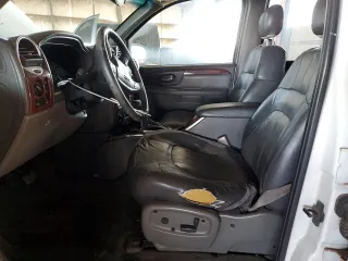 2002 GMC Envoy SLT with VIN 1GKDT13S922128924, listed as a Copart auction lot 46131035 with 162,499 mi miles and Salvage Title. Bid and sale history available at carsss.com. Image 7.