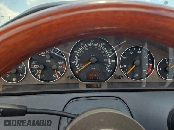 1999 Mercedes-Benz SL 500 with VIN WDBFA68FXXF184548, listed as a Copart auction lot 63814775 with 133,681 mi miles and Clean title. Bid and sale history available at DreamBid. Image 8.