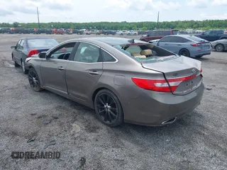 2013 Hyundai Azera with VIN KMHFH4JG2DA263558, listed as a IAAI auction lot 42434288 with 147,282 mi miles and . Bid and sale history available at DreamBid. Image 3.