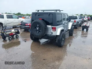 2012 Jeep Wrangler Unlimited Call of Duty MW3 with VIN 1C4BJWFG7CL281844, listed as a IAAI auction lot 42494946 with 93,669 mi miles and . Bid and sale history available at DreamBid. Image 4.