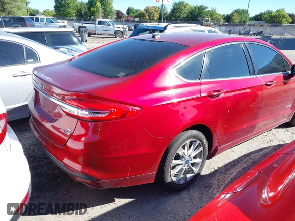 2017 Ford Fusion Hybrid SE with VIN 3FA6P0LU7HR317604, listed as a IAAI auction lot 42713039 with 302,322 mi miles and . Bid and sale history available at DreamBid. Image 4.