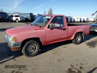 1991 Toyota Pickup with VIN JT4RN81AXM0072912, listed as a Copart auction lot 86072004 with 210,493 mi miles and Salvage Title. Bid and sale history available at DreamBid. Image 1.