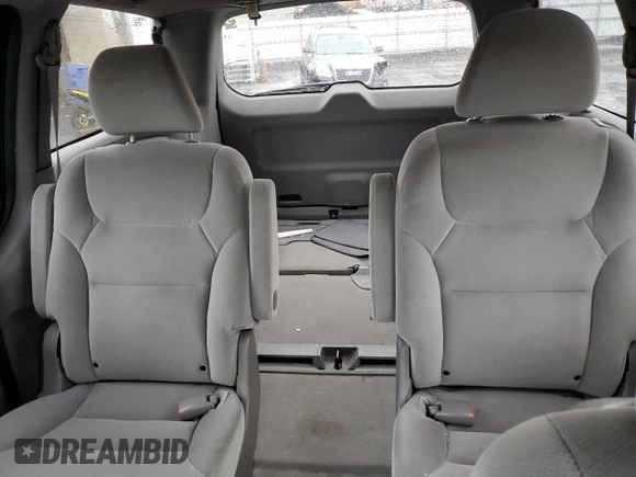 2010 Honda Odyssey LX z VIN 5FNRL3H20AB012805, wystawiony jako Copart lot #52243405 z przebiegiem 206 479 mil mil oraz Szkoda całkowita • Salvage title. Historia ofert i sprzedaży dostępna na DreamBid. Obrazek 10.