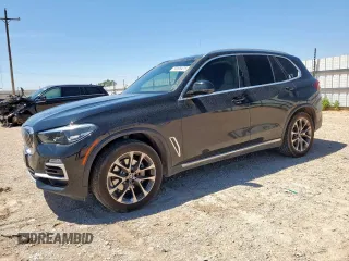 2021 BMW X5 sDrive40i with VIN 5UXCR4C09M9G23111, listed as a Copart auction lot 60509475 with 34,230 mi miles and Salvage title. Bid and sale history available at DreamBid. Image 1.