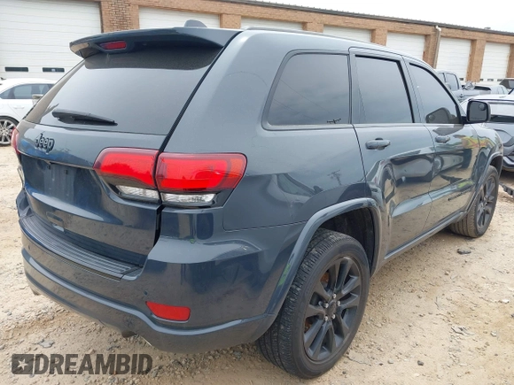 2018 Jeep Grand Cherokee Laredo with VIN 1C4RJFAG4JC303222, listed as a IAAI auction lot 42276244 with 83,585 mi miles and . Bid and sale history available at DreamBid. Image 4.