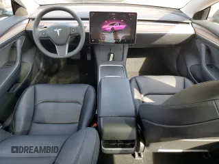 2023 Tesla Model 3 with VIN 5YJ3E1EA8PF699931, listed as a Copart auction lot 49293795 with 13,119 mi miles and Salvage Title. Bid and sale history available at DreamBid. Image 8.