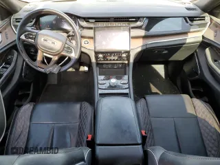 2023 Jeep Grand Cherokee Summit Reserve z VIN 1C4RJYE62PC652630, wystawiony jako Copart lot #55110525 z przebiegiem 21 186 mil mil oraz Szkoda całkowita • Salvage title. Historia ofert i sprzedaży dostępna na DreamBid. Obrazek 8.