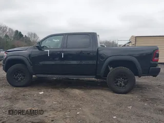 2022 Ram 1500 TRX with VIN 1C6SRFU9XNN476106, listed as a IAAI auction lot 41627895 with 21,992 mi miles and . Bid and sale history available at DreamBid. Image 14.