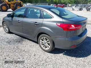 2018 Ford Focus SE z VIN 1FADP3FE1JL238012, wystawiony jako IAAI lot #42185232 z przebiegiem 143 687 mil mil oraz . Historia ofert i sprzedaży dostępna na DreamBid. Obrazek 3.