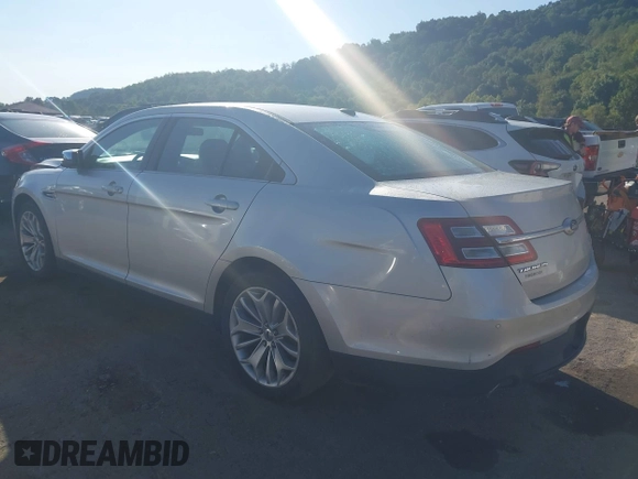 2014 Ford Taurus Limited with VIN 1FAHP2F8XEG133523, listed as a IAAI auction lot 40285220 with 134,939 mi miles. Bid and sale history available at carsss.com. Image 3.