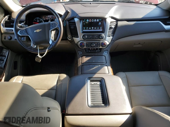 2019 Chevrolet Suburban Premier with VIN 1GNSKJKC6KR293389, listed as a Copart auction lot 77700264 with 49,057 mi miles and Salvage Title. Bid and sale history available at DreamBid. Image 8.