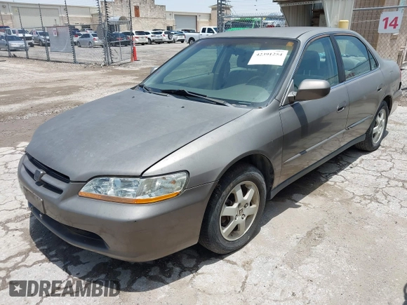 2000 Honda Accord SE z VIN 1HGCG5673YA090469, wystawiony jako IAAI lot #42391254 z przebiegiem 140 819 mil mil oraz . Historia ofert i sprzedaży dostępna na DreamBid. Obrazek 2.