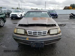 1987 Ford Thunderbird with VIN 1FABP6036HH185658, listed as a Copart auction lot 76998984 with 0 mi miles and Clean Title. Bid and sale history available at carsss.com. Image 5.
