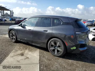 2023 BMW iX xDrive50 with VIN WB523CF02PCM92379, listed as a Copart auction lot 47726814 with 7,721 mi miles. Bid and sale history available at carsss.com. Image 2.