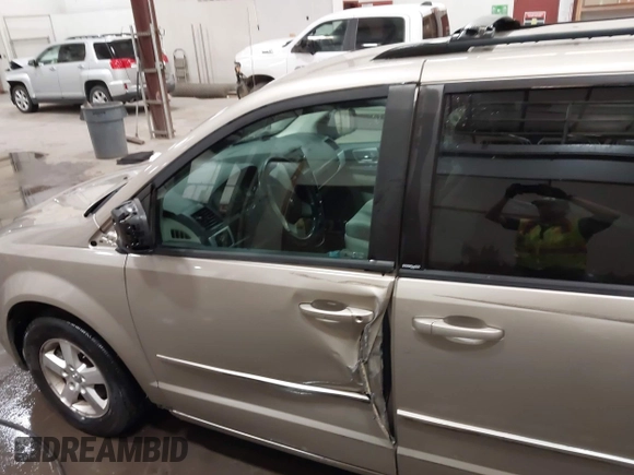2009 Dodge Grand Caravan SXT z VIN 2D8HN541X9R652097, wystawiony jako IAAI lot #42370946 z przebiegiem 189 911 mil mil oraz . Historia ofert i sprzedaży dostępna na DreamBid. Obrazek 6.