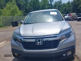 2018 Honda Ridgeline RTL z VIN 5FPYK2F5XJB001064, wystawiony jako IAAI lot #42252956 z przebiegiem 95 272 mil mil oraz . Historia ofert i sprzedaży dostępna na DreamBid. Obrazek 13.