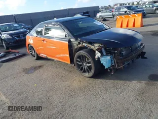 2015 Scion tC with VIN JTKJF5C79FJ008795, listed as a IAAI auction lot 41570815 with 88,809 mi miles. Bid and sale history available at carsss.com. Image 1.