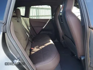 2023 BMW iX xDrive50 z VIN WB523CF02PCM92379, wystawiony jako Copart lot #47726814 z przebiegiem 7721 mil mil oraz . Historia ofert i sprzedaży dostępna na DreamBid. Obrazek 10.