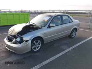 2003 Mazda Protege DX with VIN JM1BJ225X31160766, listed as a IAAI auction lot 41941361 with 190,125 mi miles and . Bid and sale history available at DreamBid. Image 2.