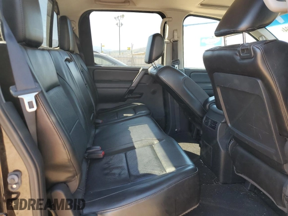 2014 Nissan Titan Pro-4X with VIN 1N6AA0EC2EN519983, listed as a Copart auction lot 71496934 with 150,259 mi miles and Salvage title. Bid and sale history available at DreamBid. Image 10.