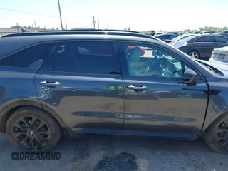 2023 Kia Sorento SX z VIN 5XYRK4LF3PG242259, wystawiony jako IAAI lot #41970398 z przebiegiem 31 293 mil mil oraz . Historia ofert i sprzedaży dostępna na DreamBid. Obrazek 13.