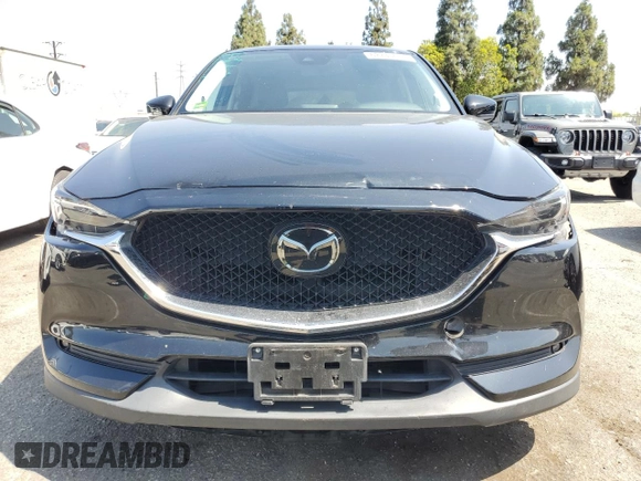 2018 Mazda CX-5 Grand Touring with VIN JM3KFBDM4J0348165, listed as a Copart auction lot 62733665 with 80,693 mi miles and Salvage title. Bid and sale history available at DreamBid. Image 5.