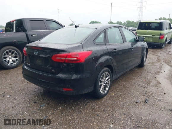 2017 Ford Focus SE with VIN 1FADP3F26HL276139, listed as a IAAI auction lot 42316774 with 165,227 mi miles and . Bid and sale history available at DreamBid. Image 4.