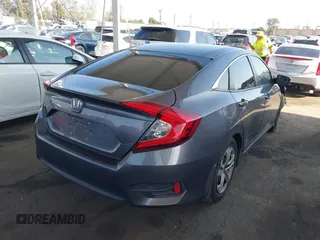 2017 Honda Civic LX z VIN 2HGFC2F53HH538362, wystawiony jako IAAI lot #42095715 z przebiegiem 156 799 mil mil oraz . Historia ofert i sprzedaży dostępna na DreamBid. Obrazek 4.