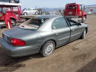2001 Mercury Sable LS Premium with VIN 1MEFM55S71G632734, listed as a IAAI auction lot 42011855 with 211,402 mi miles and . Bid and sale history available at carsss.com. Image 4.