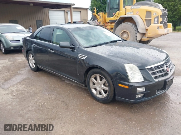 2008 Cadillac STS RWD with VIN 1G6DK67V980165768, listed as a IAAI auction lot 42185454 with 214,813 mi miles and . Bid and sale history available at DreamBid. Image 1.