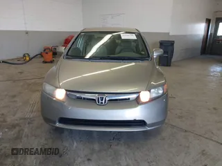 2006 Honda Civic LX z VIN 1HGFA16556L005459, wystawiony jako IAAI lot #41940768 z przebiegiem 178 595 mil mil oraz . Historia ofert i sprzedaży dostępna na DreamBid. Obrazek 12.