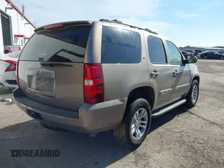 2007 Chevrolet Tahoe LS with VIN 1GNFC13J57R183484, listed as a IAAI auction lot 40837034 with Not provided miles and . Bid and sale history available at DreamBid. Image 4.