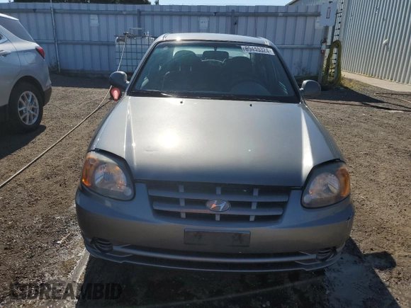 2005 Hyundai Accent GLS with VIN KMHCG45C05U605716, listed as a Copart auction lot 69445324 with 158,082 mi miles and Clean Title. Bid and sale history available at carsss.com. Image 5.