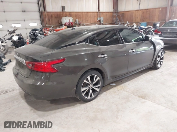 2016 Nissan Maxima Platinum with VIN 1N4AA6AP3GC404618, listed as a IAAI auction lot 42372458 with 133,968 mi miles and . Bid and sale history available at DreamBid. Image 4.