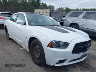 2013 Dodge Charger RT with VIN 2C3CDXCT2DH654844, listed as a IAAI auction lot 41880210 with 127,984 mi miles. Bid and sale history available at carsss.com. Image 1.