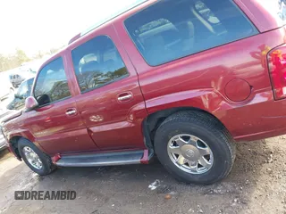 2003 Cadillac Escalade z VIN 1GYEC63T53R146068, wystawiony jako IAAI lot #41634405 z przebiegiem 272 263 mil mil oraz . Historia ofert i sprzedaży dostępna na DreamBid. Obrazek 14.