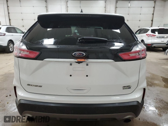 2020 Ford Edge SEL z VIN 2FMPK4J90LBB13748, wystawiony jako Copart lot #65687415 z przebiegiem 108 629 mil mil oraz Czysty tytuł • Clean title. Historia ofert i sprzedaży dostępna na DreamBid. Obrazek 6.