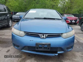 2006 Honda Civic Cpe EX with VIN 2HGFG12826H560333, listed as a IAAI auction lot 42131156 with 182,438 mi miles. Bid and sale history available at carsss.com. Image 6.