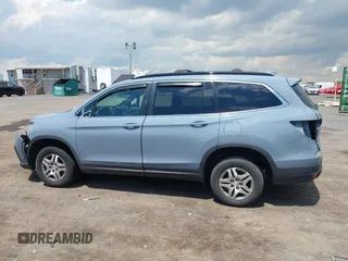 2022 Honda Pilot Special Edition with VIN 5FNYF6H27NB104990, listed as a IAAI auction lot 42219770 with 23,200 mi miles and . Bid and sale history available at DreamBid. Image 14.