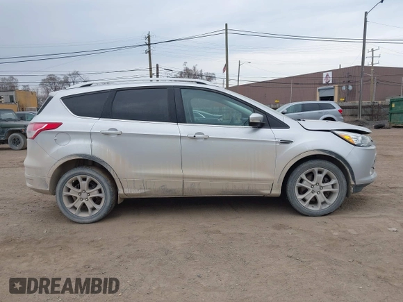 2015 Ford Escape Titanium with VIN 1FMCU9J92FUA60166, listed as a IAAI auction lot 41914080 with 103,122 mi miles and . Bid and sale history available at DreamBid. Image 13.