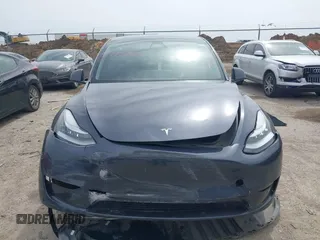 2023 Tesla Model Y Long Range with VIN 7SAYGDEE0PA036048, listed as a IAAI auction lot 41775845 with 41,291 mi miles. Bid and sale history available at carsss.com. Image 11.