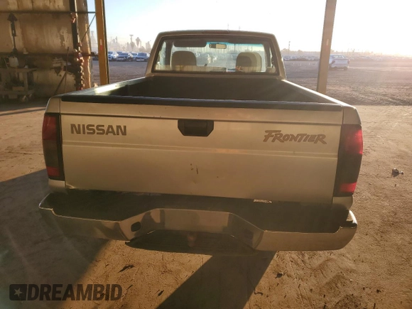 2000 Nissan Frontier XE z VIN 1N6DD21S5YC340513, wystawiony jako Copart lot #89018755 z przebiegiem 237 418 mil mil oraz Szkoda całkowita • Salvage title. Historia ofert i sprzedaży dostępna na DreamBid. Obrazek 6.