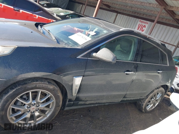 2014 Cadillac SRX Premium Collection z VIN 3GYFNDE34ES581728, wystawiony jako IAAI lot #41578226 z przebiegiem 121 118 mil mil oraz . Historia ofert i sprzedaży dostępna na DreamBid. Obrazek 15.
