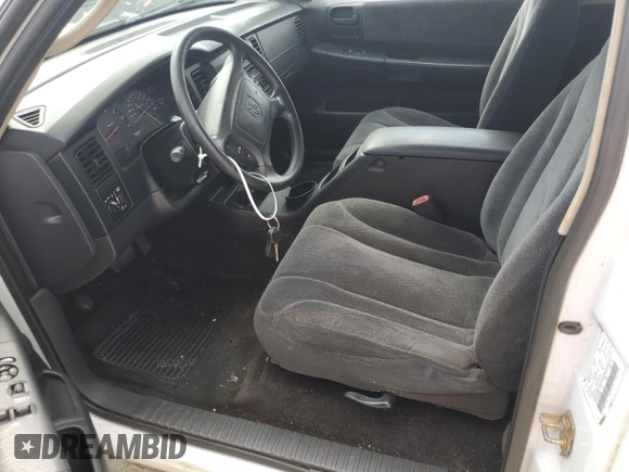 2003 Dodge Dakota SLT with VIN 1D7HL42XX3S333865, listed as a Copart auction lot 73509404 with 123,515 mi miles and Salvage Title. Bid and sale history available at carsss.com. Image 7.